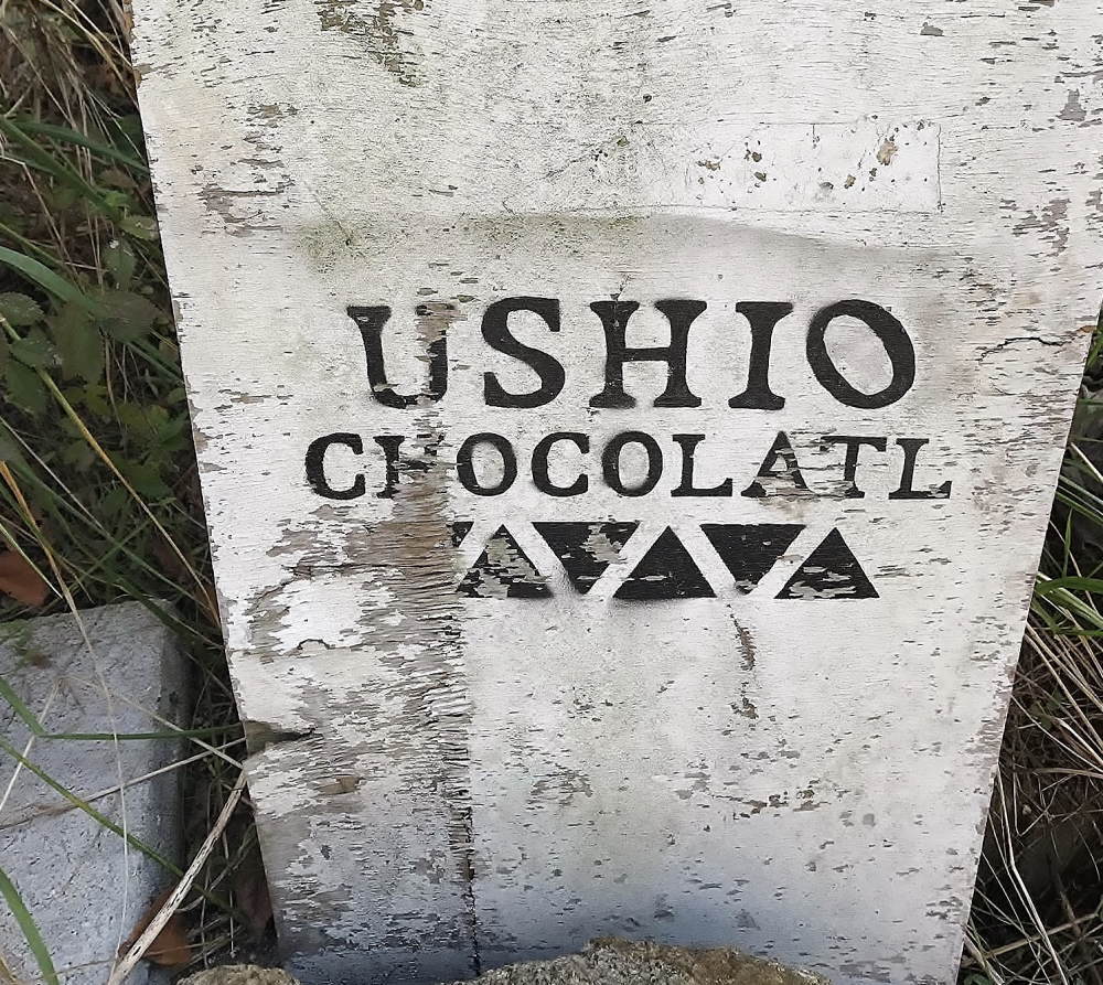 ウシオチョコラトル 看板